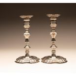 A PAIR OF GEORGE II SILVER CANDLESTICKS, maker John Cafe, London 1749, the unmarked detachable