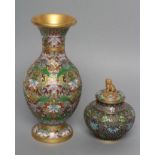 A CHINESE CLOISONNE ENAMEL VASE of ovoid form with waisted neck and flared rim, enamelled in