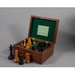 A JACQUES "STAUNTON" CHESS SET, early 20th century, in boxwood and ebony, each weighted piece with