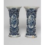 A PAIR OF L.P. KAN DUTCH DELFT VASES, early 19th century, of canted oblong form, each with a