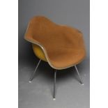 A CHARLES & RAY EAMES FOR HERMAN MILLER SHELL CHAIR in yellow fibre glass with brown woven