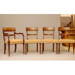 A SET OF EIGHT REGENCY MAHOGANY DINING CHAIRS with ebony stringing and including two elbow chairs,