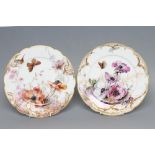 A PAIR OF KPM BERLIN PORCELAIN CABINET PLATES, c.1900, of lobed circular form, later painted in
