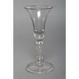 A WINE GLASS, c.1740, the bell bowl on hollow baluster stem and folded foot, 6" high (