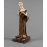 AFTER GEORGES VAN DER STRAETEN (Belgian 1856-1928) an Art Deco bronze and ivory figure cast as a