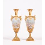A PAIR OF ROYAL WORCESTER CHINA VASES, 1912, of slender ovoid form, with swag moulded high neck, the