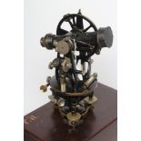 A LACQUERED BRASS THEODOLITE by Cooke, Troughton & Simms Ltd, No.Y2295, with 8 1/4" tube, mounted to