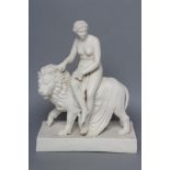 A VICTORIAN PARIAN GROUP - "UNA AND THE LION", after John Bell, the lion standing on an oblong base,