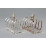 A PAIR OF ART DECO SILVER FIVE BAR TOASTRACKS, maker Henry Clifford Davis, Birmingham 1949, of