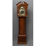 AN OAK LONGCASE by Samuel Smith, Holywell, the eight day movement striking on a bell, 11 1/2" arched