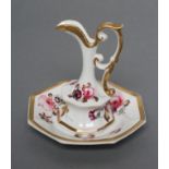 A ROCKINGHAM PORCELAIN MINIATURE EWER AND STAND, c.1835, of octagonal form, painted in colours