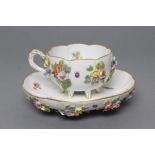 A MEISSEN PORCELAIN CABINET CUP AND SAUCER, late 19th century, of lobed circular form with