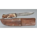 A GERMAN COMBINATION HUNTING KNIFE, with 5" clip point blade, Decora maker's mark, grip