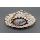 A CHAMBERLAIN & CO. WORCESTER PORCELAIN BASKET, c.1800, of leaf moulded circular form with