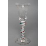 A WINE GLASS, mid 18th century, the bell bowl engraved with fruiting vine, double spiral stem with