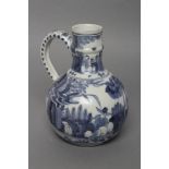 A PORCELAIN EWER of globular form with knopped cylindrical neck and plain loop handle, painted in