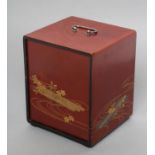 A JAPANESE LACQUER KODANSU, 20th century, of vertical oblong form with silvered metal carrying