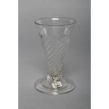AN ALE GLASS, late 18th century, the wrythen moulded conical bowl on folded conical foot, 4" high (