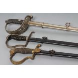 THREE CHILD'S SWORDS, comprising a German infantry officer's sword with a 23 1/4" blade, a German