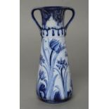 A MACINTYRE MOORCROFT POTTERY FLORIANWARE VASE, early 20th century, of tapering cylindrical form