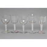 A COLLECTION OF FIVE OPAQUE SPIRAL TWIST GLASSES, 19th century and later, comprising a matched