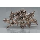 A LARGE VICTORIAN DIAMOND SPRAY BROOCH, the flowerhead centred by an old cut stone of