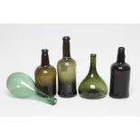 A COLLECTION OF GREEN GLASS WINE/SPIRIT BOTTLES, late 18th/early 19th century, comprising an onion