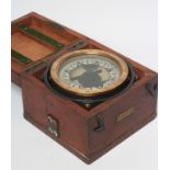 A SHIP'S COMPASS by E. Dent & Co., London, c.1900, with black and off-white markings, maker's