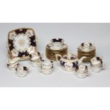 A COALPORT CHINA BATSWING PATTERN TEA SERVICE, early 20th century, comprising thirteen cups and