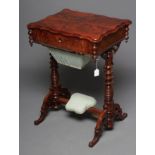 A VICTORIAN MAHOGANY WORK TABLE of serpentine oblong form with turned pendants, unusual sliding