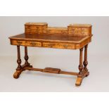 A VICTORIAN BURR WALNUT WRITING TABLE of canted oblong form with stringing and inset with brown