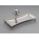 A GEORGE III SILVER SCISSOR SNUFFER'S TRAY, maker probably Ebenezer Coker, London 1768, of waisted