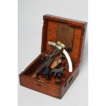 A SHIP'S BRASS SEXTANT by J. Coombes, Devonport and inscribed "A.G. Mack RN", in mahogany box with