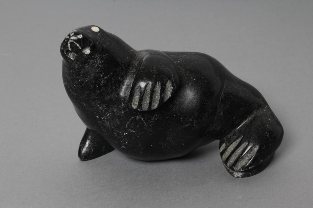 THREE INUIT STONE CARVINGS depicting a seal, walrus and a seabird, two signed and and one with " - Image 4 of 8