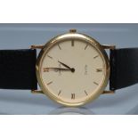 A GENTLEMAN'S 18CT GOLD OMEGA DE VILLE WRISTWATCH, the champagne dial with gilt batons and Roman