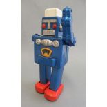 Late issue clockwork robot with walking action, some rusting, slight damage, F (Est. plus 21%