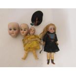 Two French bisque socket head dolls, one 9 1/2" doll with brown sleeping eyes, open mouth and