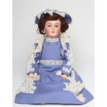 A Simon & Halbig bisque socket head doll, with blue glass sleeping eyes, open mouth and teeth,