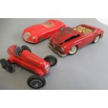 Schuco 1050 race car in red and playworn Schuco 5503 Elektro Car, parts damaged/missing, P, and a