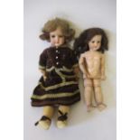 Two German bisque socket head dolls, comprising a 19" Heubach Koppelsdorf 250 0 with brown glass