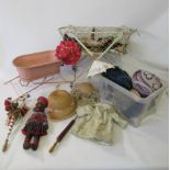A quantity of dolls accessories, comprising ten parasols, assorted hats and garments, together