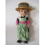 An SFBJ Unis France bisque socket head doll, with blue glass sleeping eyes, open mouth and teeth,