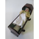 An SFBJ bisque head character doll, with blue glass sleeping eyes, open mouth, flock hair and