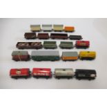 Twenty Hornby Dublo unboxed wagons including S.R. Parcels van, B.R. Coal wagons, Tank wagons and