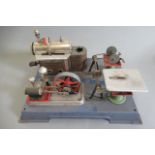 Wilesco stationary steam engine, spirit fired, single cylinder driving two power tools, some minor