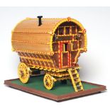 A well made model of a horse drawn gypsy caravan, wood construction, fine decoration with detailed