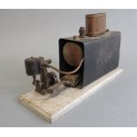 Small Marine type spirit fired engine with single oscillating cylinder on wooden base, F (Est.