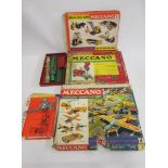 Playworn Meccano parts in red/green and yellow/blue, most items boxed, AF, some parts missing, F-