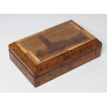 A NAPOLEONIC PRISONER OF WAR STRAW WORK BOX of plain oblong form, the cover worked with a view of