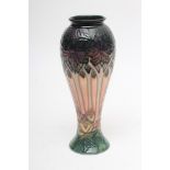 A MOORCROFT POTTERY CLUNY PATTERN VASE, 1993, of slender inverted baluster form, tubelined and